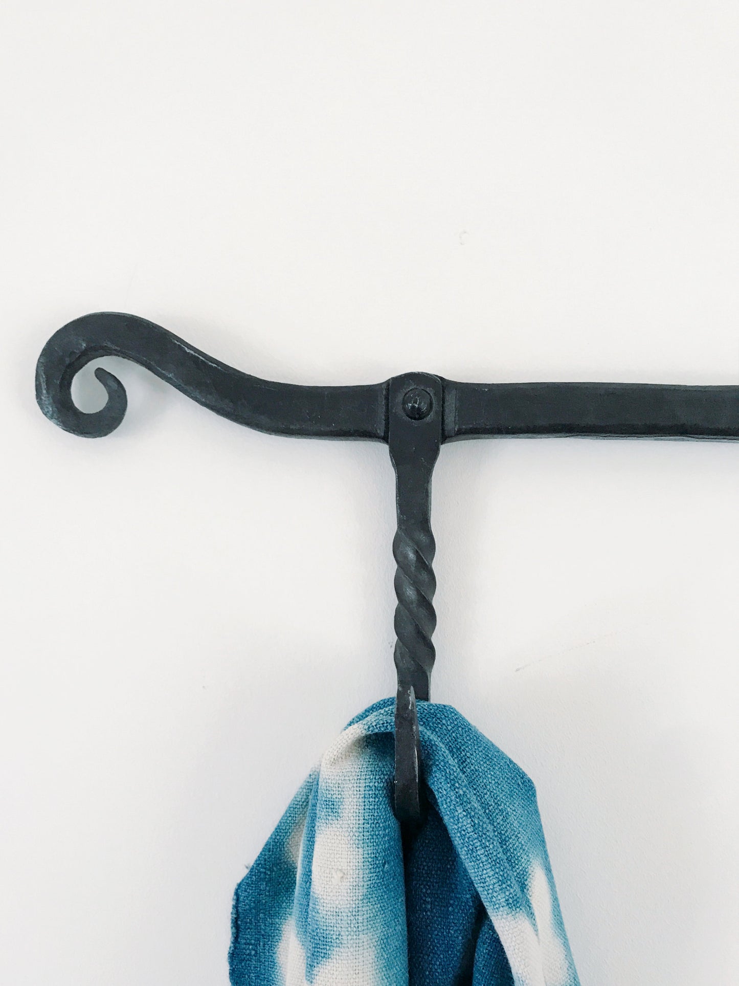 Triple hook with scrolled ends