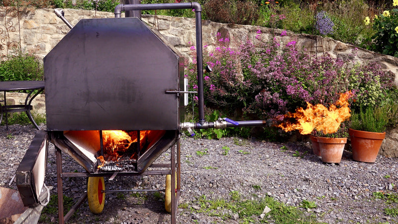 Off grid gasifier and charcoal retort